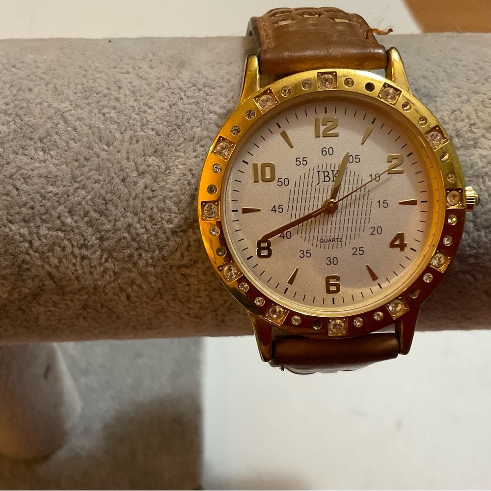 Seiko: men’s  but unisex Camrose, Kross Jackie Onassis collection leather watch.